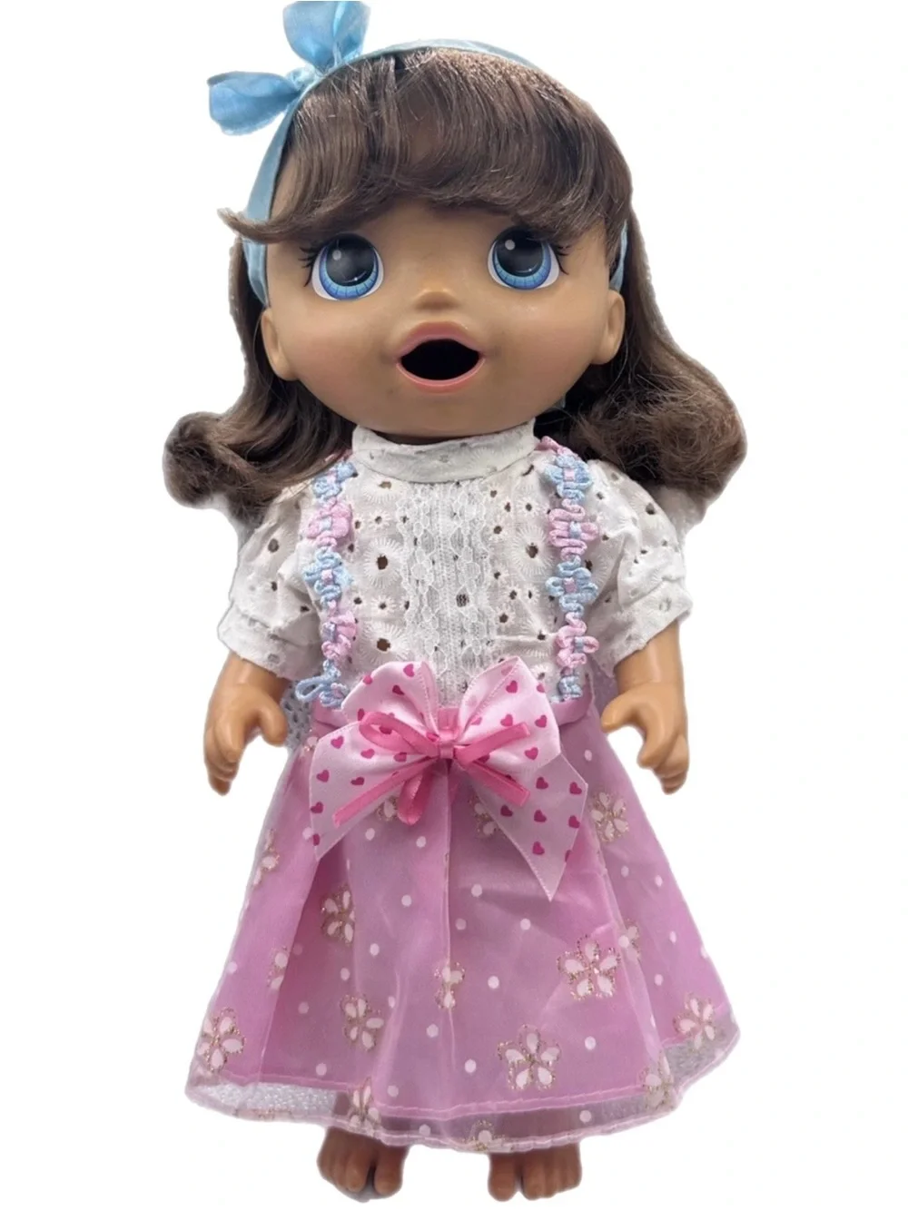 Dress-Up Baby Doll with Pink Floral Skirt and Blue Accessories